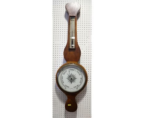 A 19th century walnut cased banjo barometer and thermometer,&nbsp;an oak cased circular barometer, four late 19th century iro