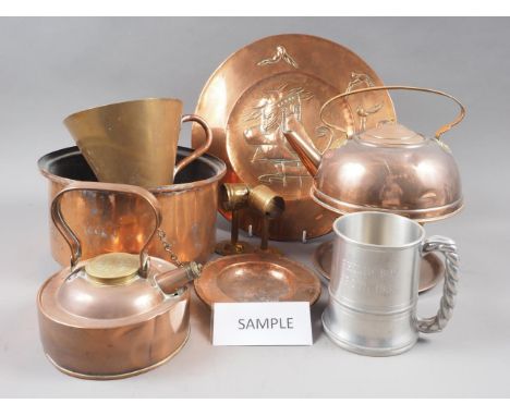 Two copper kettles, two copper wall panels, a copper oil lamp and other metal wares 
