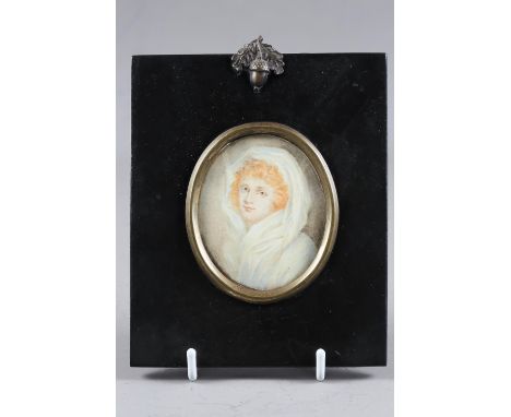 After Romney: a watercolour portrait miniature of Emma Lady Hamilton, 2 3/4" x 2 1/4", in ebonised frame 