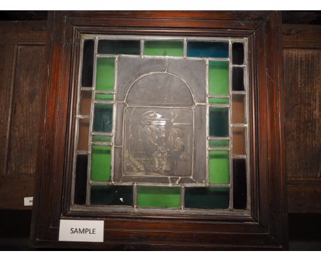 An early 20th century back lit stained glass and leaded window Annunciation, in stained pine frame, 22 1/2" x 22"Light source