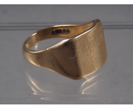 A 9ct gold signet ring (band split), 9.6g 