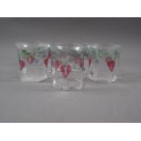 A set of eight Orrefors enamelled glass tumblers