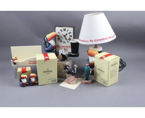 A Guinness Heritage Ceramic "Toucan &amp; Pint Side Lamp" and shade, serial number G0127, a Guinness "Toucan Clock", serial n