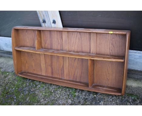 A 1960s Ercol elm 268 plate rack, 42" wide x 5" deep x 19 1/4" high 