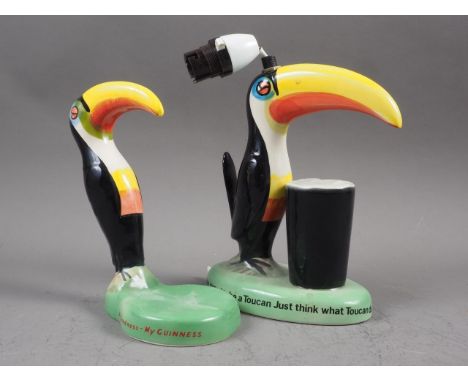 A Carltonware Guinness toucan and pint table lamp, 8 1/2" high, and a similar Carltonware Guinness toucan model, 7 1/4" high 
