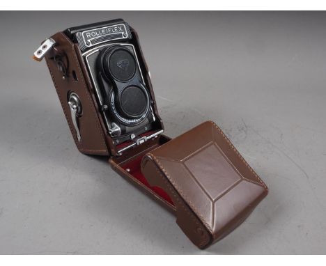 A&nbsp; Rolleiflex twin lens reflex camera, in leather case 