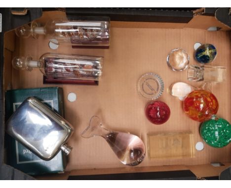 A mixed collection of items to include paperweights, boxed polished pewter hip flask and 2 ship in bottle ornaments (1 tray).