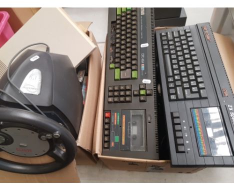 A mixed collection of vintage computers and gaming consoles ZX Spectrum 128K, Atari 2600, games, cables etc. 