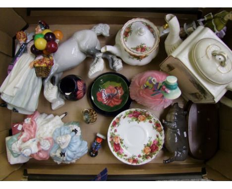 A collection of various pottery all with some damage, including Royal Doulton figures, Moorcroft, Beswick, Wade, etc