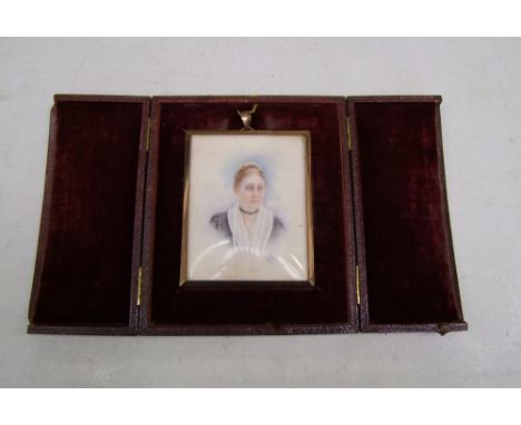 Hand Painted Signed Miniature Portrait in a leather travel case 