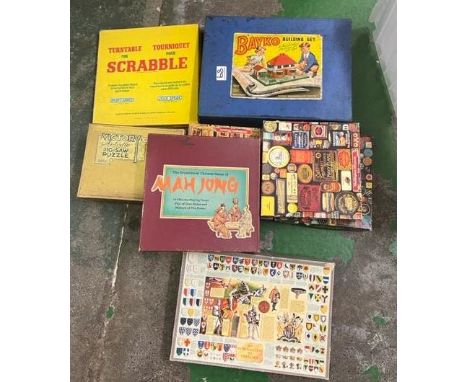Mixed collection of vintage jigsaws and board games