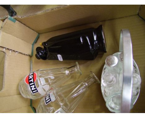 Two Martini decanters, Wade Sandeman decanter, and a glass cruet set. 