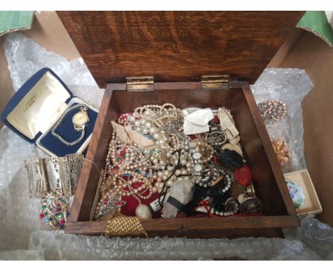 A collection of vintage costume jewellery, watches, brooches etc, contained in a shaped oak jewellery box. 