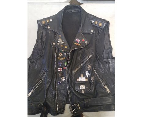 Vintage leather waistcoat with vintage pin badges 