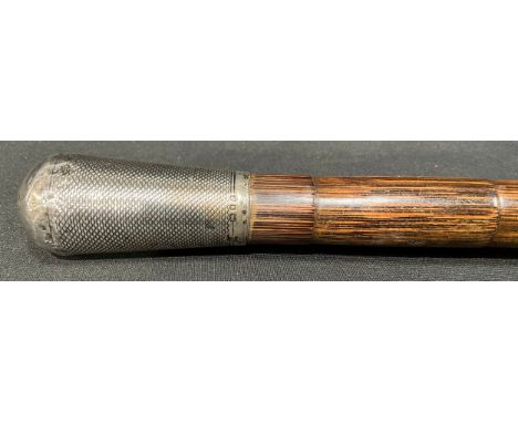 A George V silver mounted walking stick, engine turned pommel, palmwood cane, London 1920 