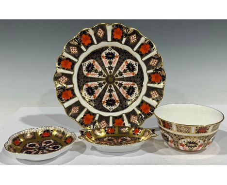 A Royal Crown Derby Imari palette 1128 pattern shaped circular dessert plate, 22cm diameter, second quality; an 1128 sugar bo