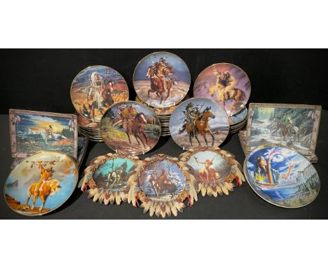 A collection of Franklin Mint Western Heritage Museum collectors plates, including Charging Warrior, Proud Hunter, Triumphant