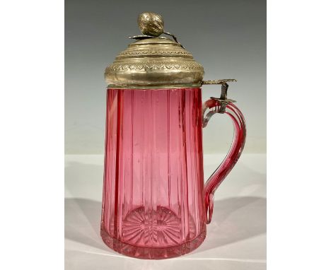 A 19th century cranberry glass tankard, silver coloured metal cover, strawberry finial, 18cm high 