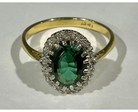 An 18ct gold emerald and diamond ring, size O, 3.7g 