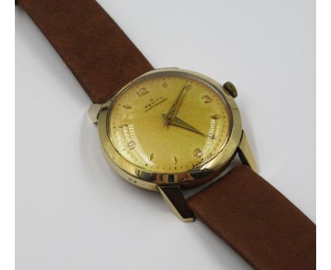 Gentleman's Zenith circular 9ct gold cased automatic wristwatch with centre seconds on a brown leather strapWatch is currentl