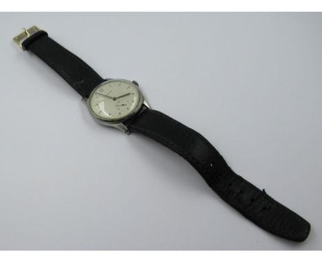 Gentleman's Longines circular stainless steel manual wind wristwatch with subsidiary seconds dial, on a black leather strapWa