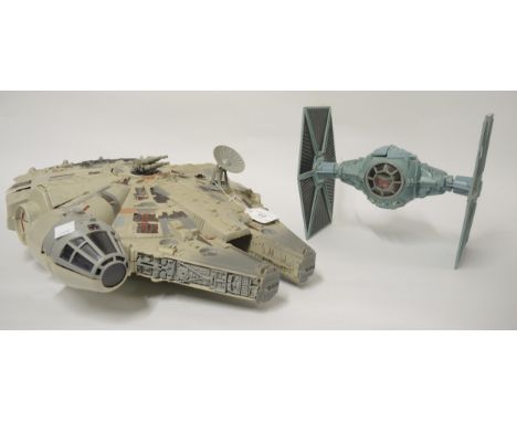Star Wars model of the Millennium Falcon 1995, together with another Star Wars model 