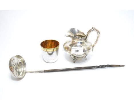 Continental white metal cream jug, an antique silver toddy ladle with whale bone handle, Continental beaker and a small quant