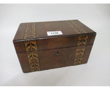 Victorian figured walnut two division tea caddy and a silver plated candlestick 