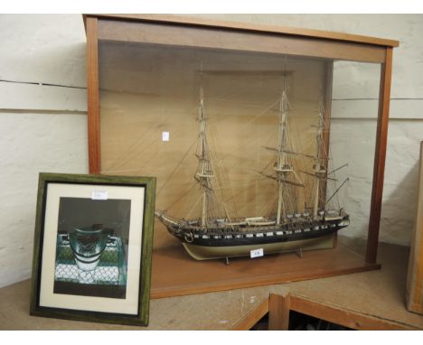 Modern hand built model of the USS Constitution in a glazed display case, 72 x 90cm x 34cm deep, together with a framed photo