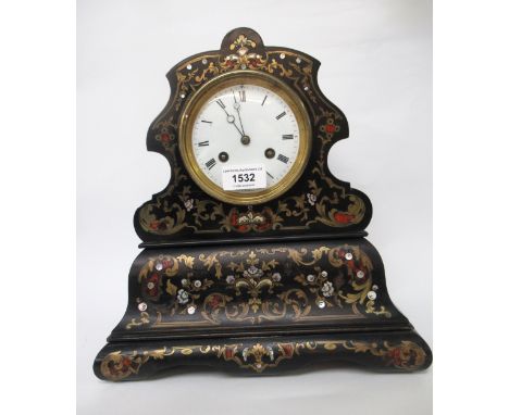 19th Century French ebonised and buhl inlaid mantel clock, shaped case with a circular enamel dial and Roman numerals, the tw