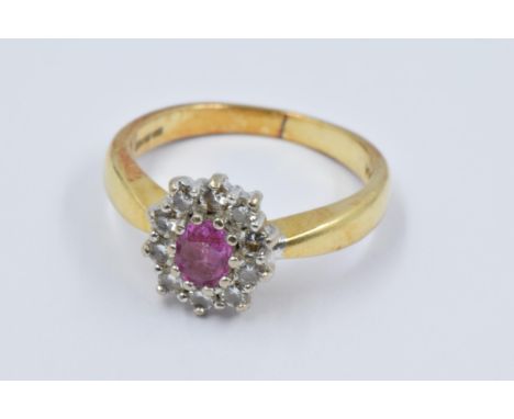 18ct Yellow gold oval ruby and diamond cluster ring, size M, 5.4g 
