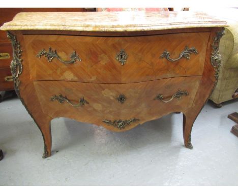 French kingwood marquetry and ormolu mounted commode, its marble top above two drawers on cabriole supports, 124cm wide 