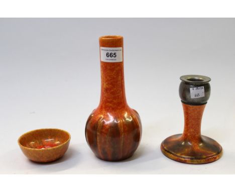 Pilkingtons orange vermilion bottle neck vase, a Tudric pewter mounted candlestick and a small bowlAll three items are in goo