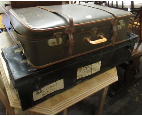 Large black japanned metal travel trunk with original labels for Malta, together with a 20th Century suitcase 