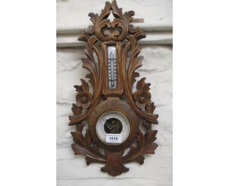 French carved beechwood aneroid barometer thermometer, together with a circular mahogany cased aneroid barometer 