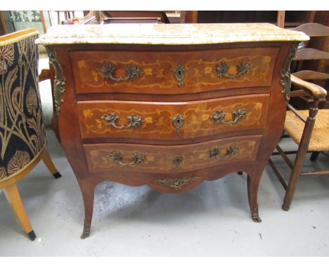 French kingwood marquetry and ormolu mounted commode, the marble top above three drawers on cabriole supports, 105cm wide 