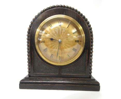 Small 1930's oak dome shaped mantel clock with a gilt dial, signed J.C. Bell, Doncaster, 17cm high, together with another mah