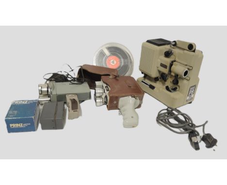 Two Austrian Eumig hand held cine cameras, together with a projector and accessories in original box 