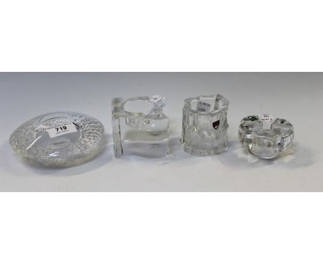Group of four Orrefors Swedish clear glass candlesticks and tea light holders 