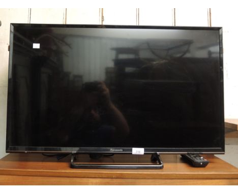 Modern Panasonic flat screen television, with lead and controllerModel#TX-32ES503B. Size 32" 