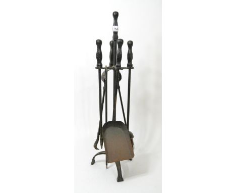 Iron fireside tool set on matching stand 