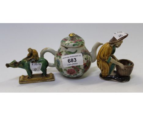 Chinese floral and bird miniature enamel decorated teapot (at fault) and two Chinese glazed pottery figures 