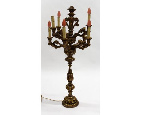 Mid 20th Century carved and gilded candelabra on associated pedestal stand, the lamp 109cm tall, the stand 100cmOne arm is mi