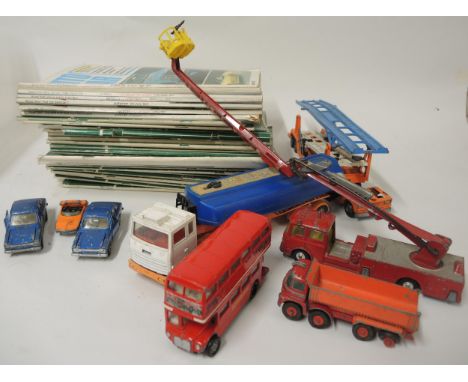 Small quantity of playworn diecast model vehicles and a quantity of modern comics etc. 