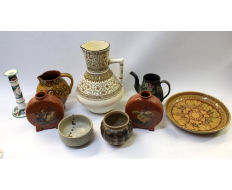 Pair of Haviland & Co. pottery moon flasks decorated with birds, a Minton floral decorated candlestick, a studio pottery bowl