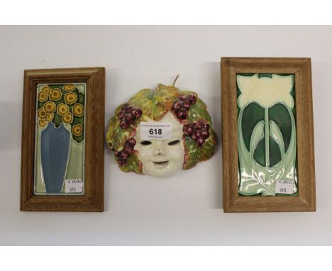 Small Continental pottery Bacchus wall mask, 14cm wide, two small art pottery tiles and a Christopher Dresser type floral and