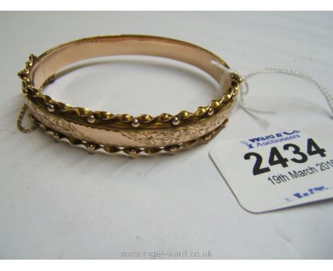 A 9ct rose Gold Bangle