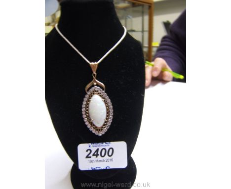 A large Coober Pedy Opal Pendant set in Gold (14 ct.) with surround of white Sapphires, gold openwork to rear  