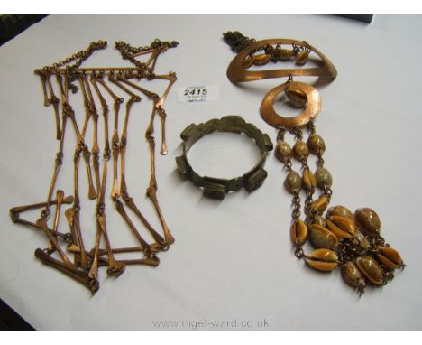 Two ethnic copper and shell Necklaces and a brass Bangle.