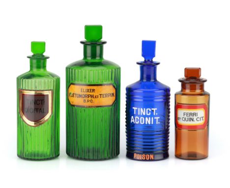 Collection of 4 Victorian Apothecary Poison Bottles,including a ribbed Bristol blue bottle with white enamel label, 2 ribbed 